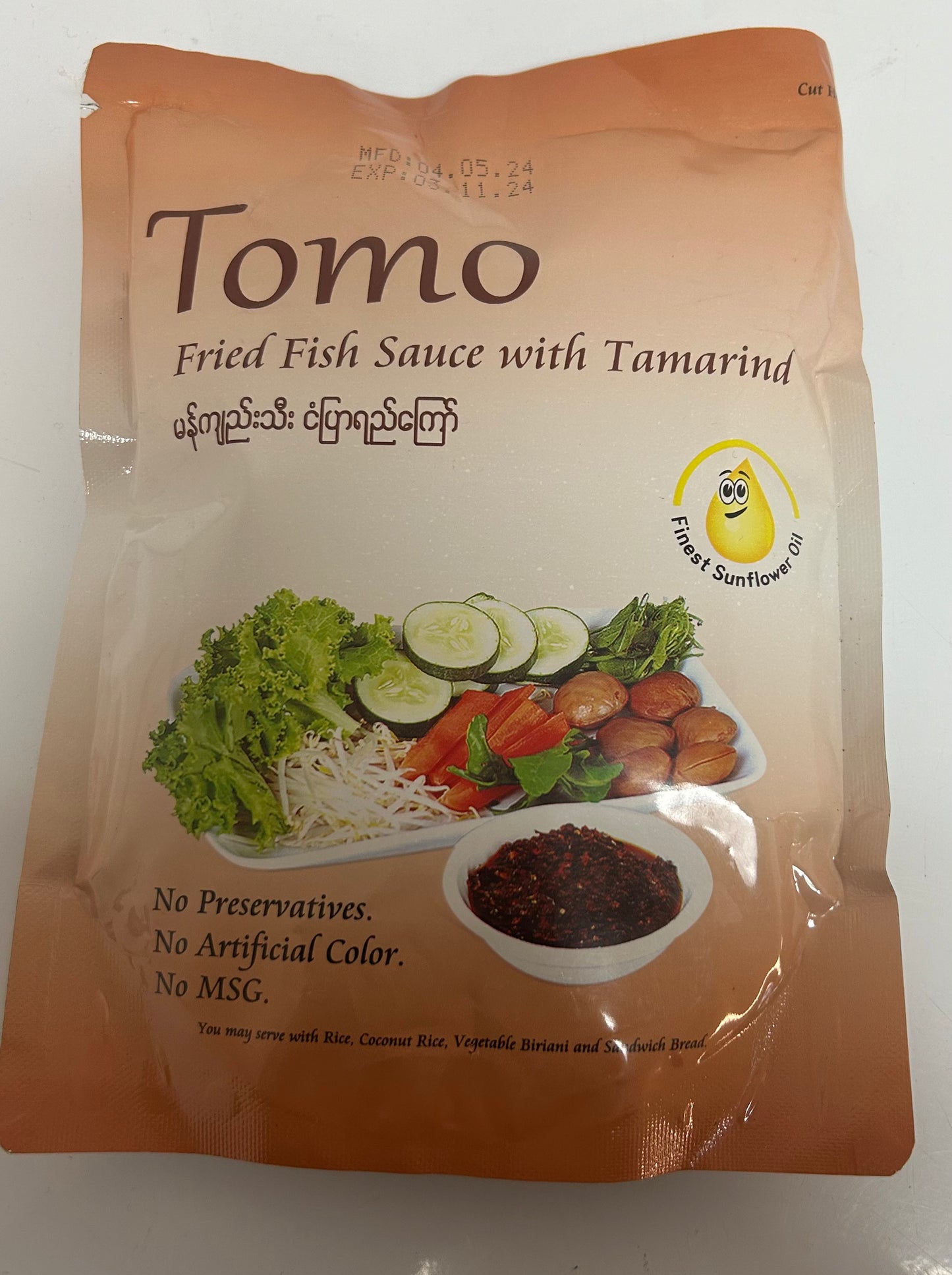 Tomo Fried fish sauce with tamarind/မန်ကျည်းသီးငံပြာရည်ကြော်